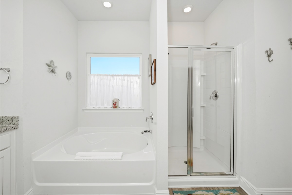 Spacious bathroom with natural light and modern fixtures