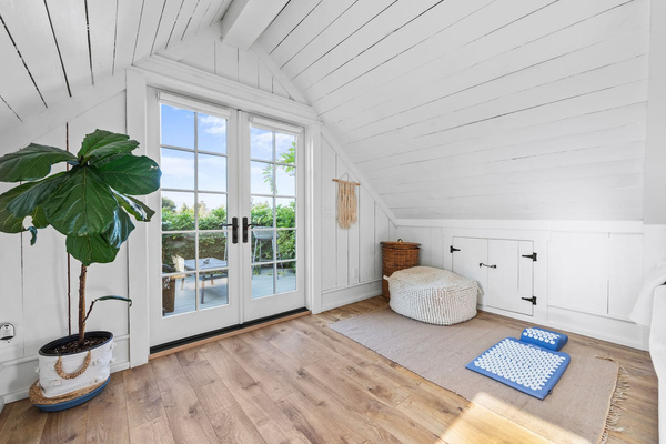 Enjoy a light filled corner for meditation, yoga, or try out the acupuncture mat!