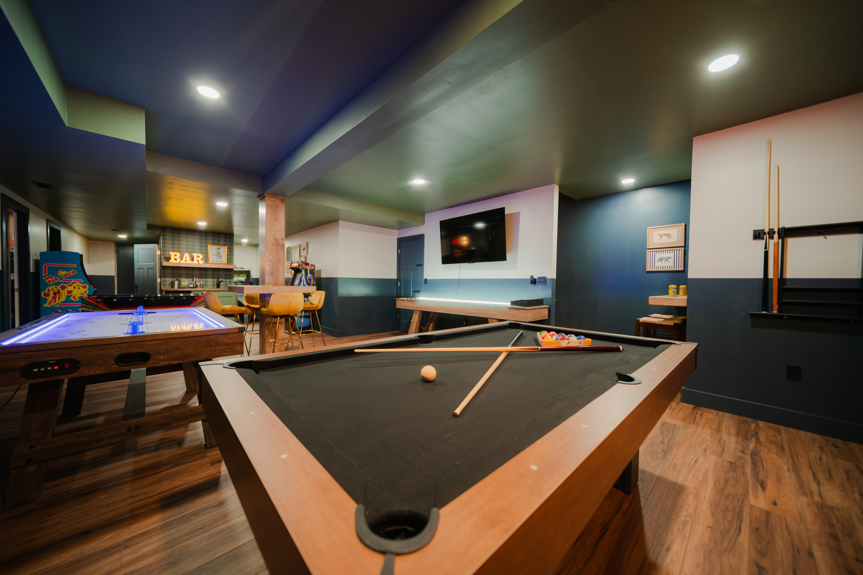 Gather, play, and unwind in a game room designed for unforgettable stays with family and friends.