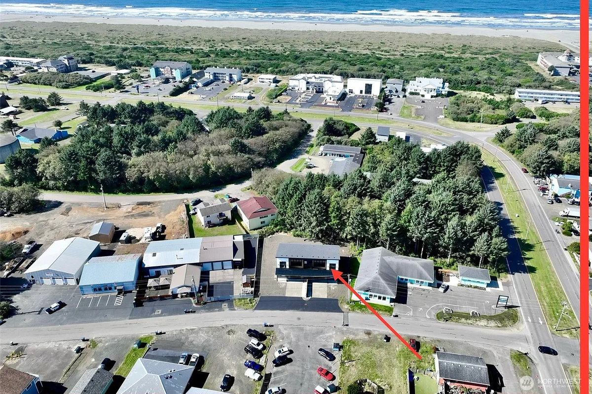 See exactly how close you really are — the ocean's right there past the rooftops, and downtown Ocean Shores is basically your backyard.