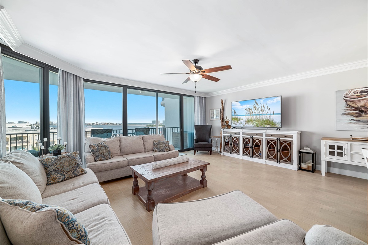 This thoughtfully designed living space maximizes natural light and integrates seamlessly with the surrounding environment. The open-concept layout and expansive windows create a bright and airy atmosphere.