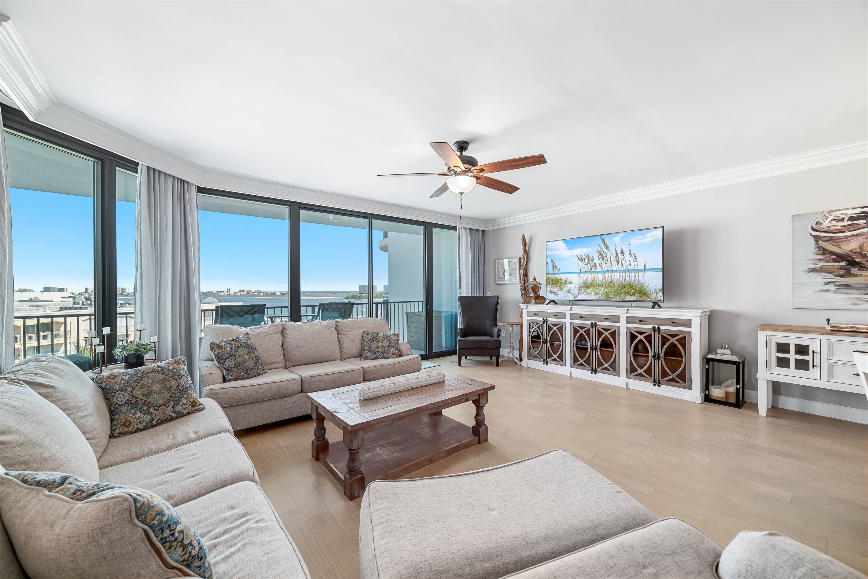This thoughtfully designed living space maximizes natural light and integrates seamlessly with the surrounding environment. The open-concept layout and expansive windows create a bright and airy atmosphere.