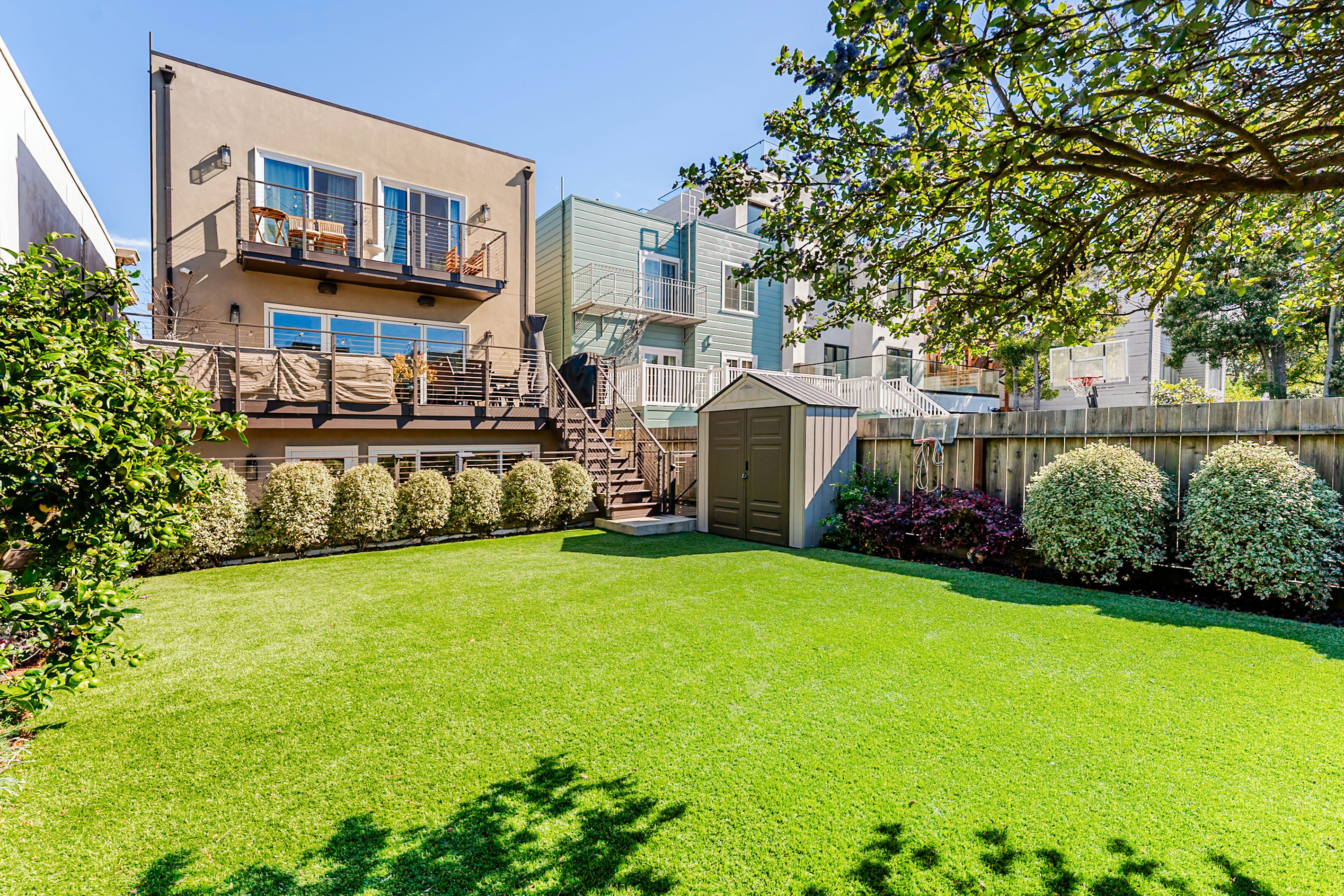 Lovely, manicured garden space to enjoy the outdoors. Please note this space is shared with upstairs residents and their incredibly friendly, cuddly Labrador named Simba. 