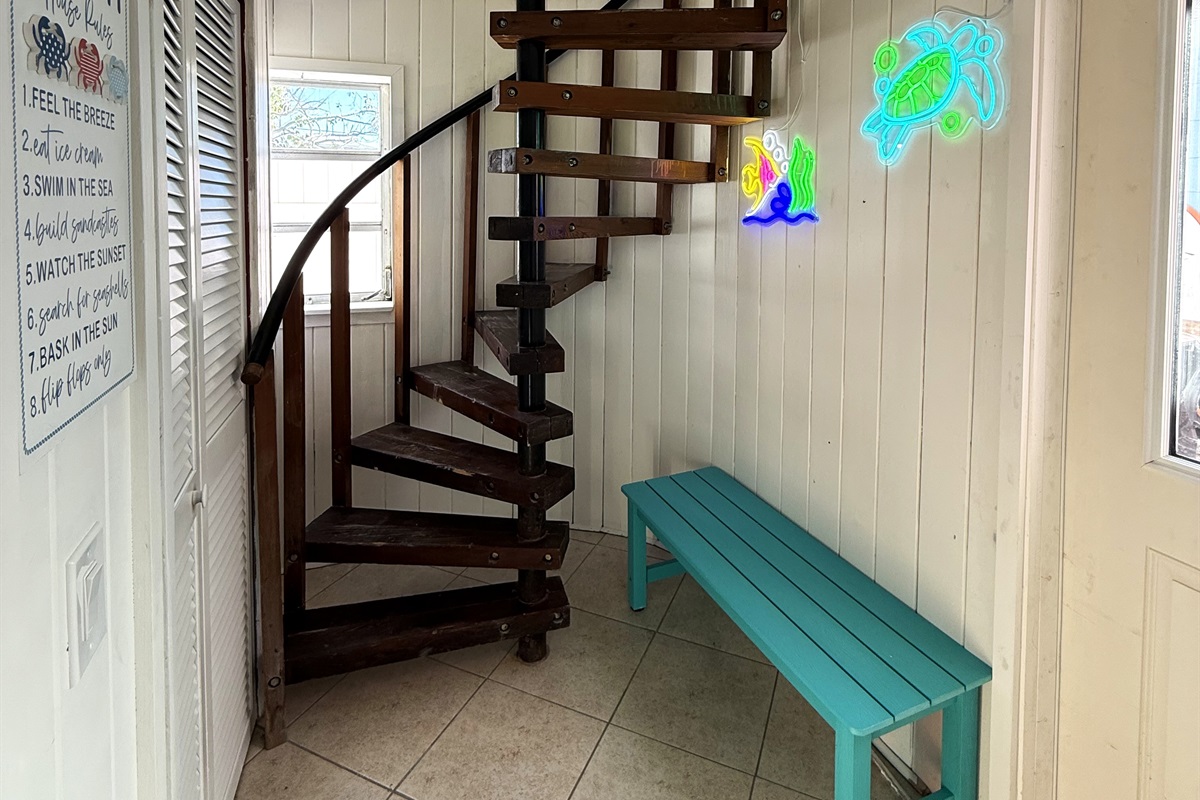 Cool Entry Way Down Stairs & Circular Stairs to Upstairs