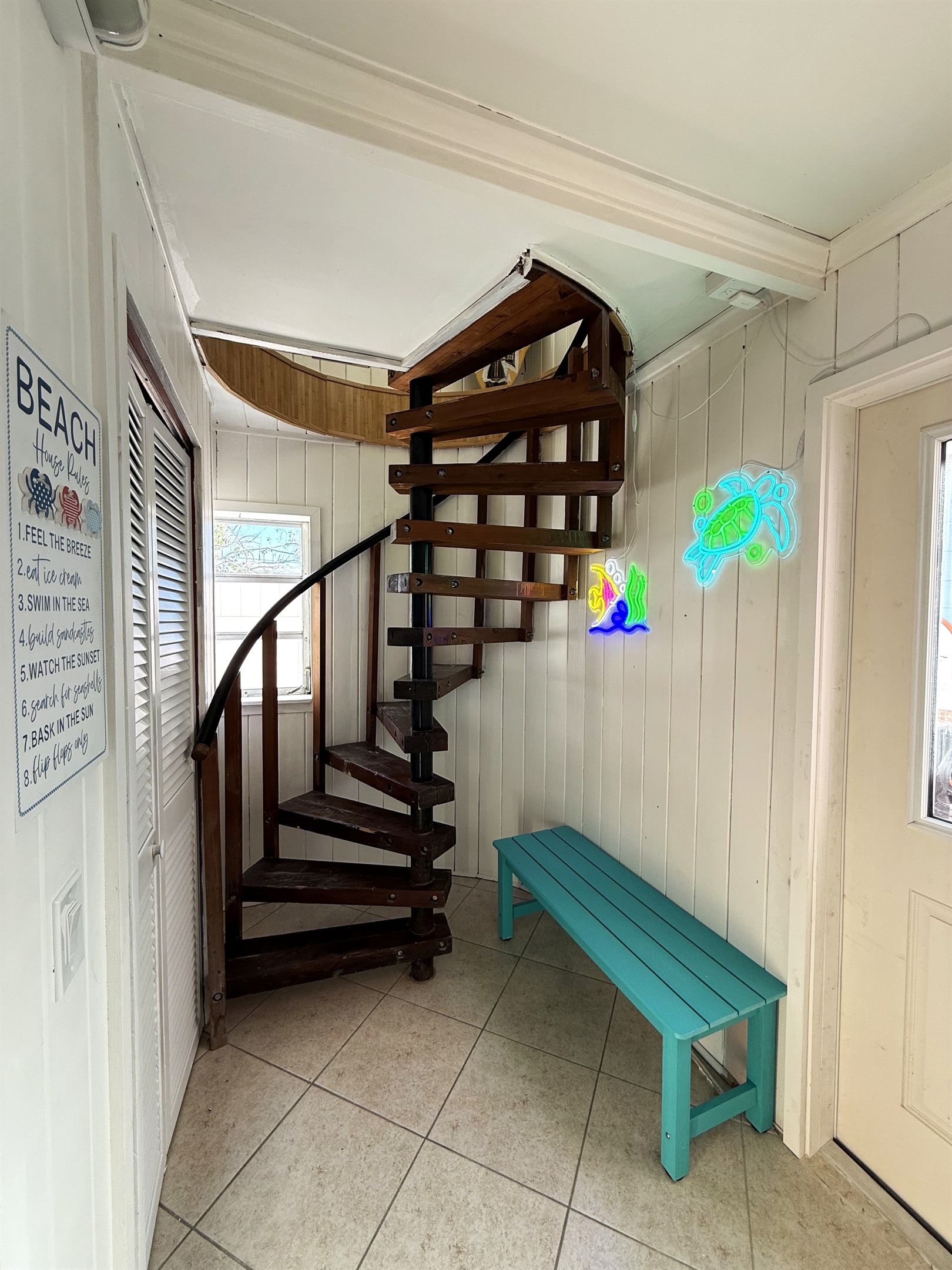 Cool Entry Way Down Stairs & Circular Stairs to Upstairs