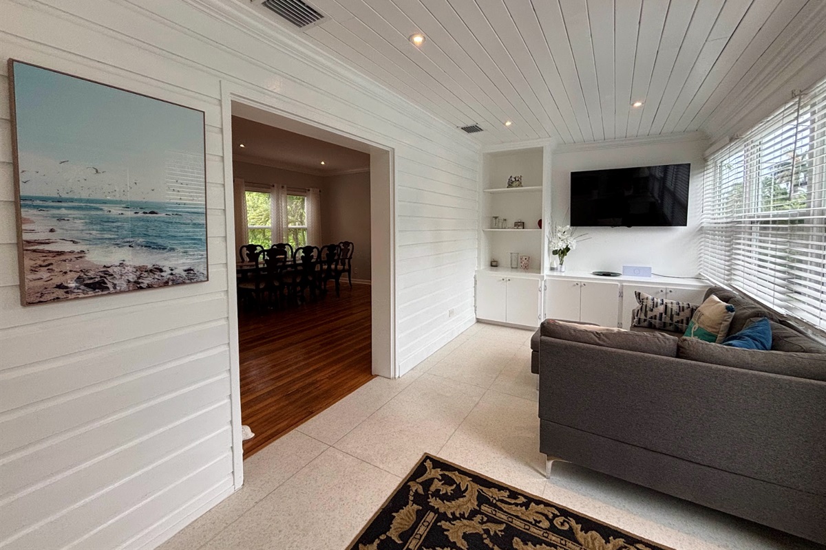 The "Florida Room" is sunny, spacious and receives a wonderful amount of natural light.