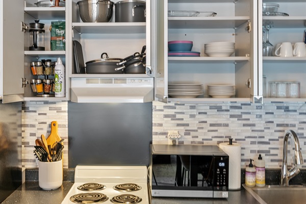 From coffee and tea to a variety of spices, you'll find everything you need in the well stocked kitchen