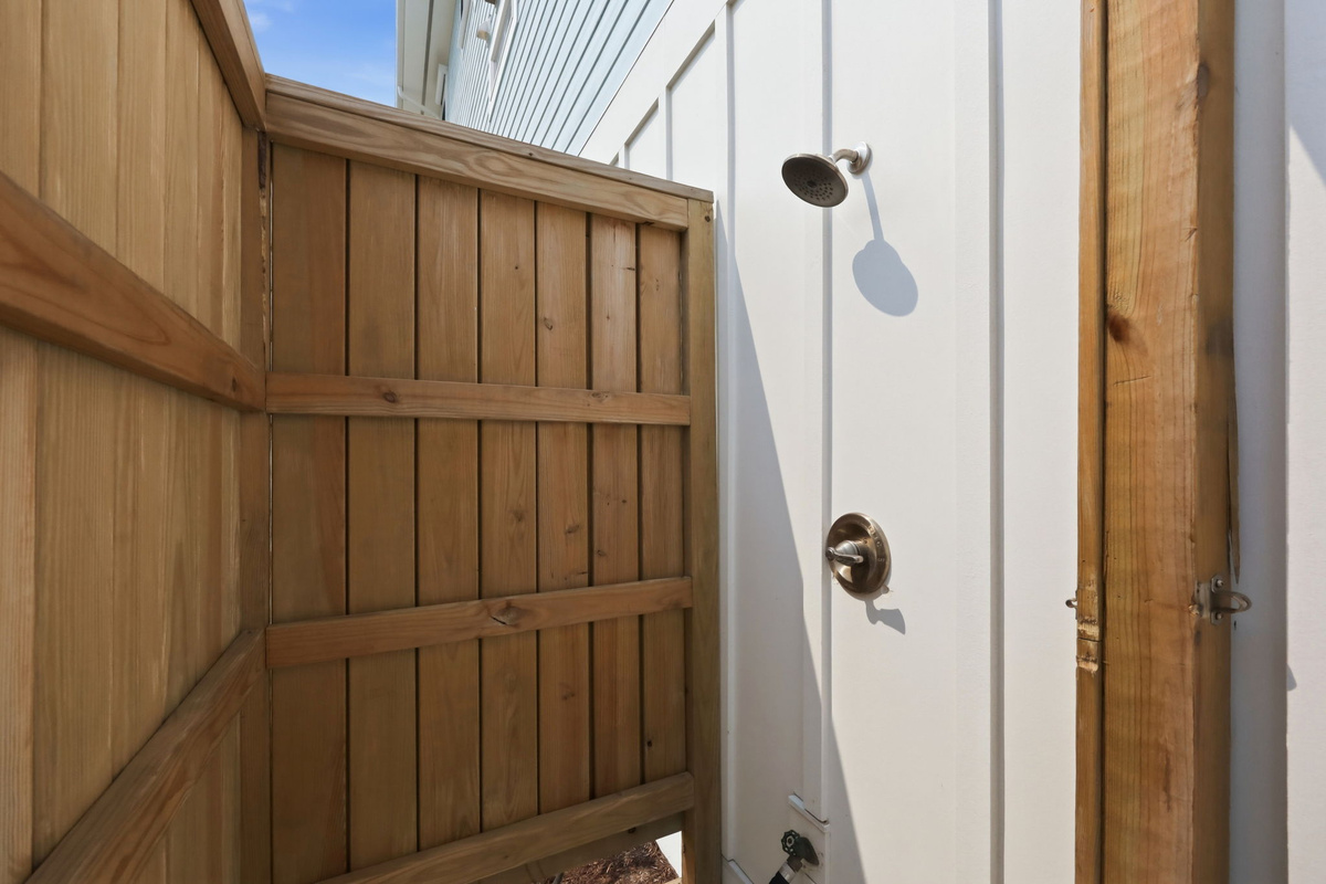 Private outdoor shower area, perfect for rinsing off after a day at the beach