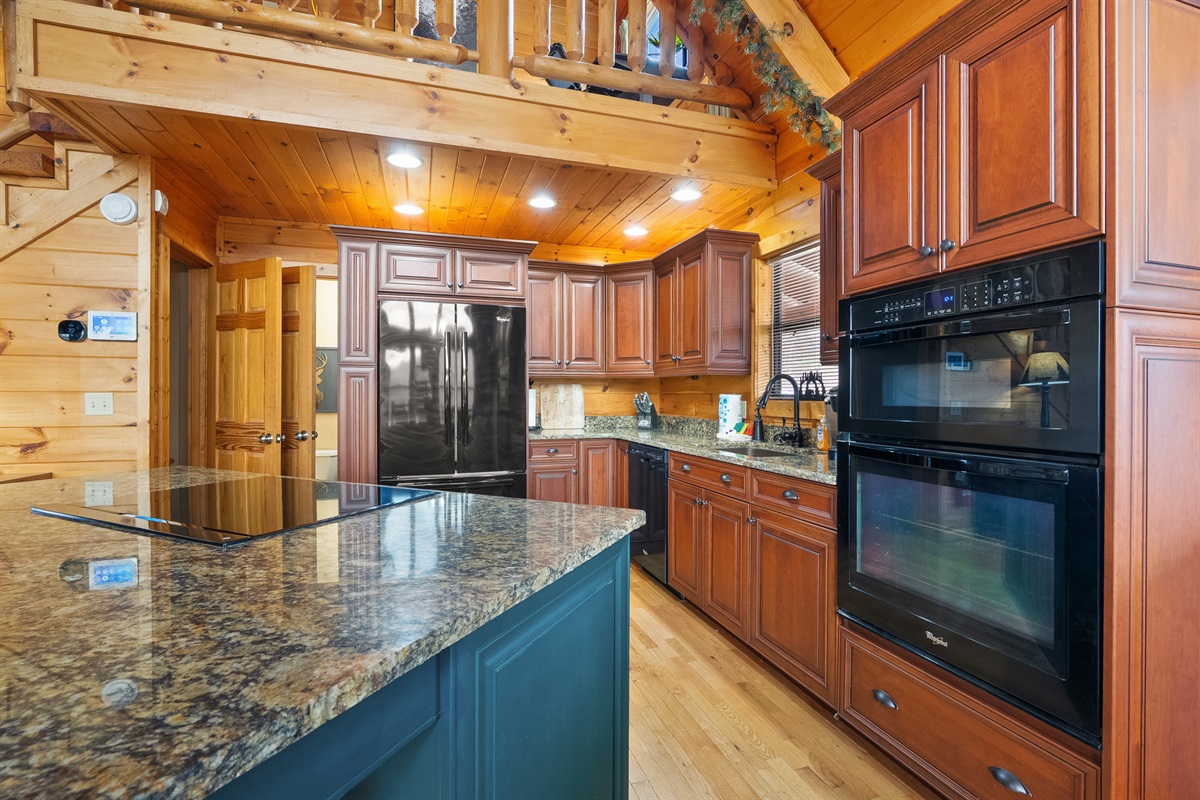 Fully equipped kitchen with plenty of space for cooking and gathering.