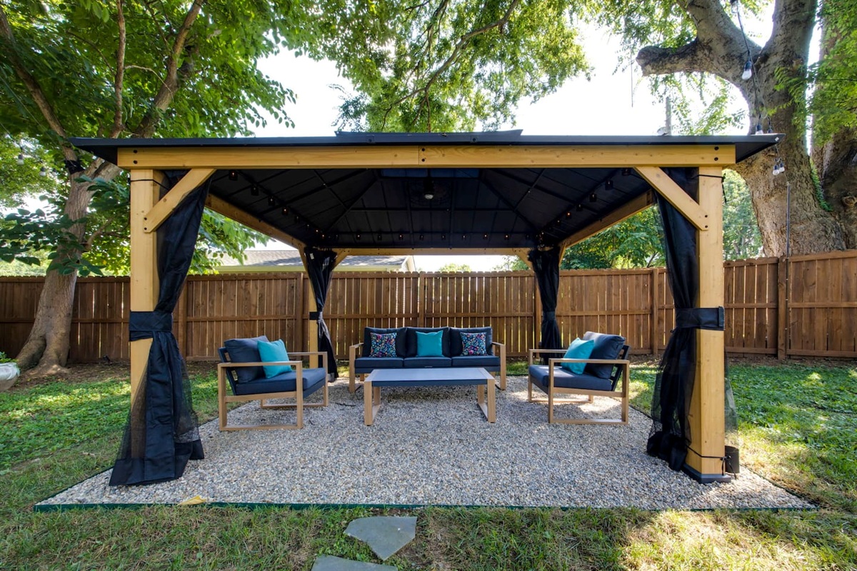 Backyard gazebo goals: quiet mornings, warm nights, and Southern charm all around.