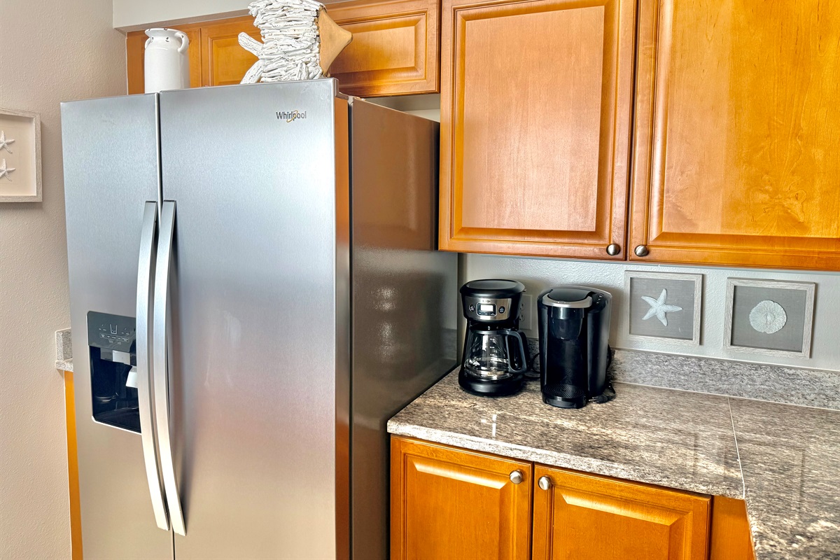 Fully Equipped Kitchen — Granite counters, a brand new 2026 stainless steel refrigerator—Take your cup of coffee to the balcony to enjoy with a regular coffee maker & a K-cup machine!