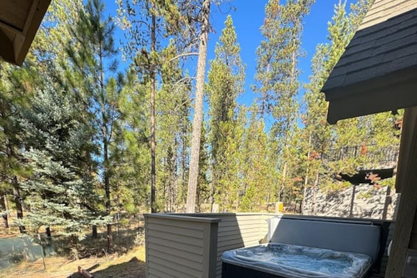 Head around the corner on the back deck to check out the lovely hot tub!