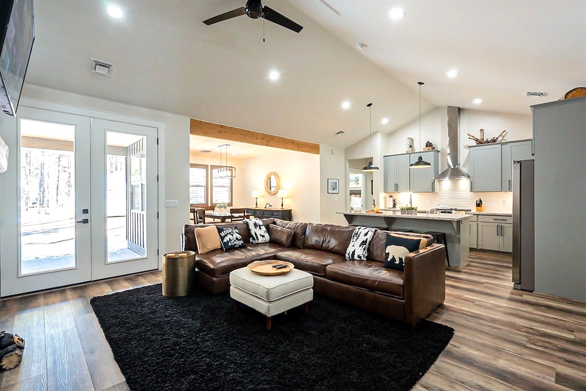 Enter into a spacious open floor plan with plenty of seating for everyone.
