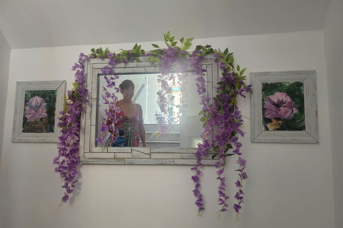 Stairway to the common area upstairs, including the BBQ on the deck