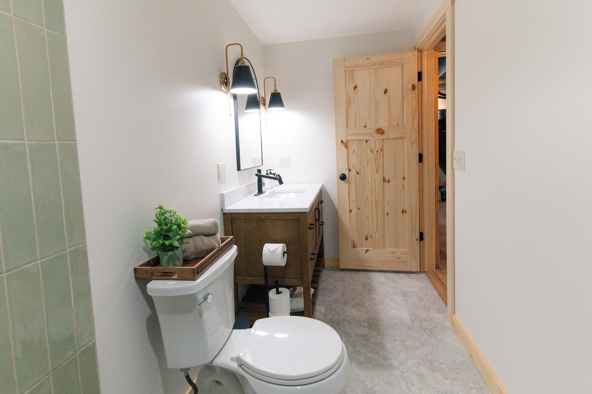 Lower level bathroom is conveniently located right by the laundry room!