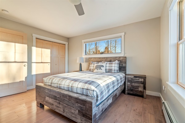 Comfortable second-level bedroom with a queen-size bed.