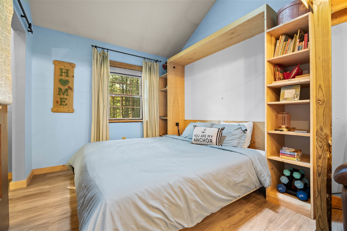 1st floor bedroom has King bed & lounge with reclining theatre seating