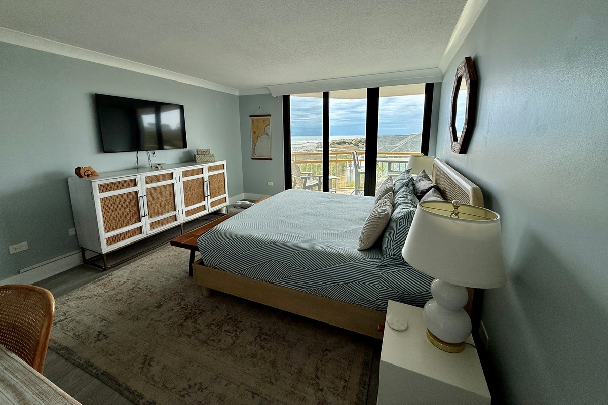 Primary Bedroom w/Sliding Glass Doors to the Balcony