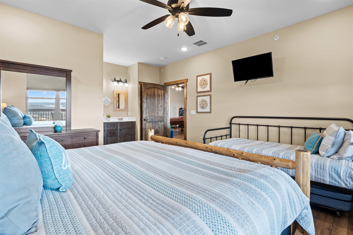 Upper level king bedroom with twin and trundle and en suite 
