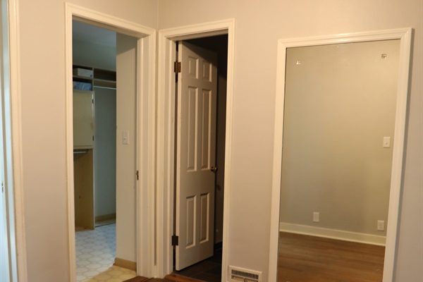 2nd Floor hallway showing storage closet, 2nd Floor small full bathroom, and full length mirror