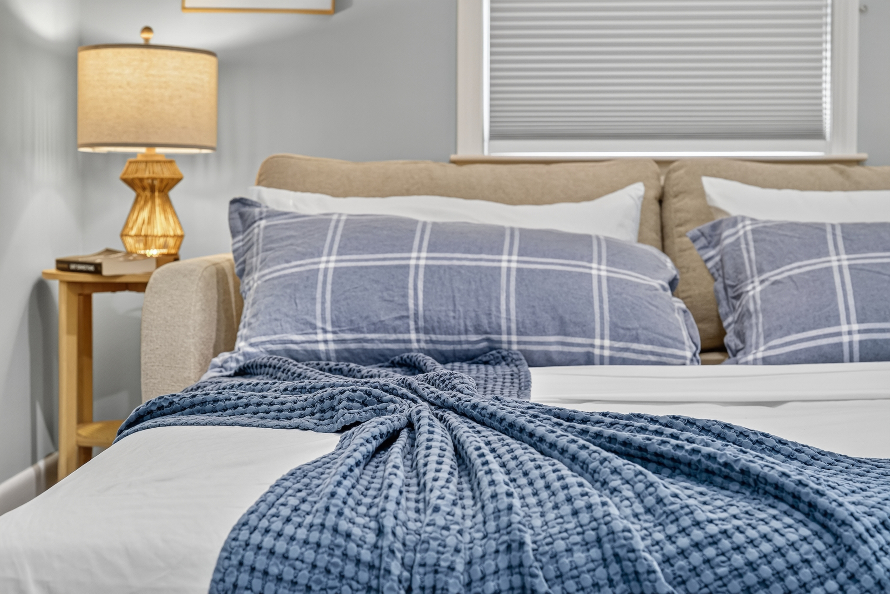 Soft, inviting linens promise a restful night's sleep.