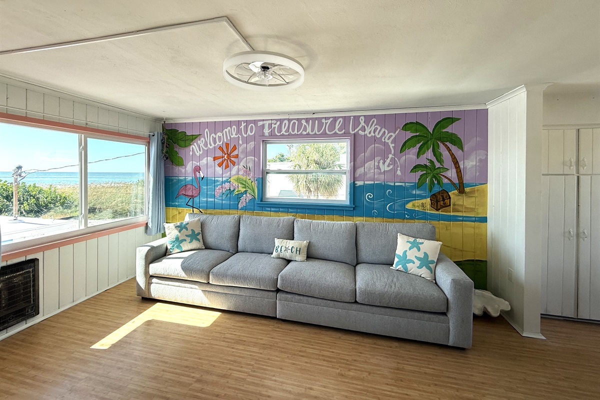Fun Living Room Mural with Super Long Couch!