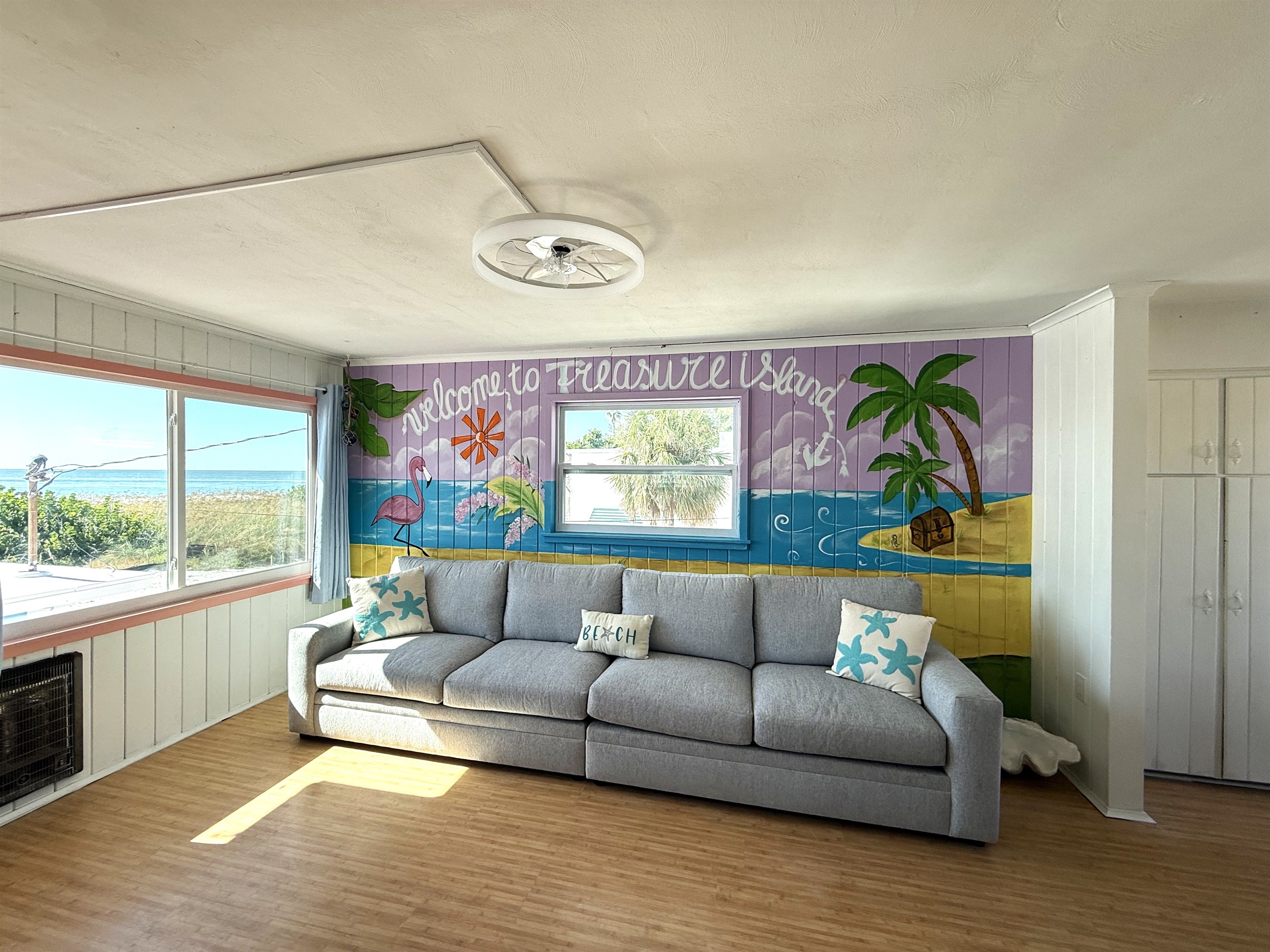 Fun Living Room Mural with Super Long Couch!