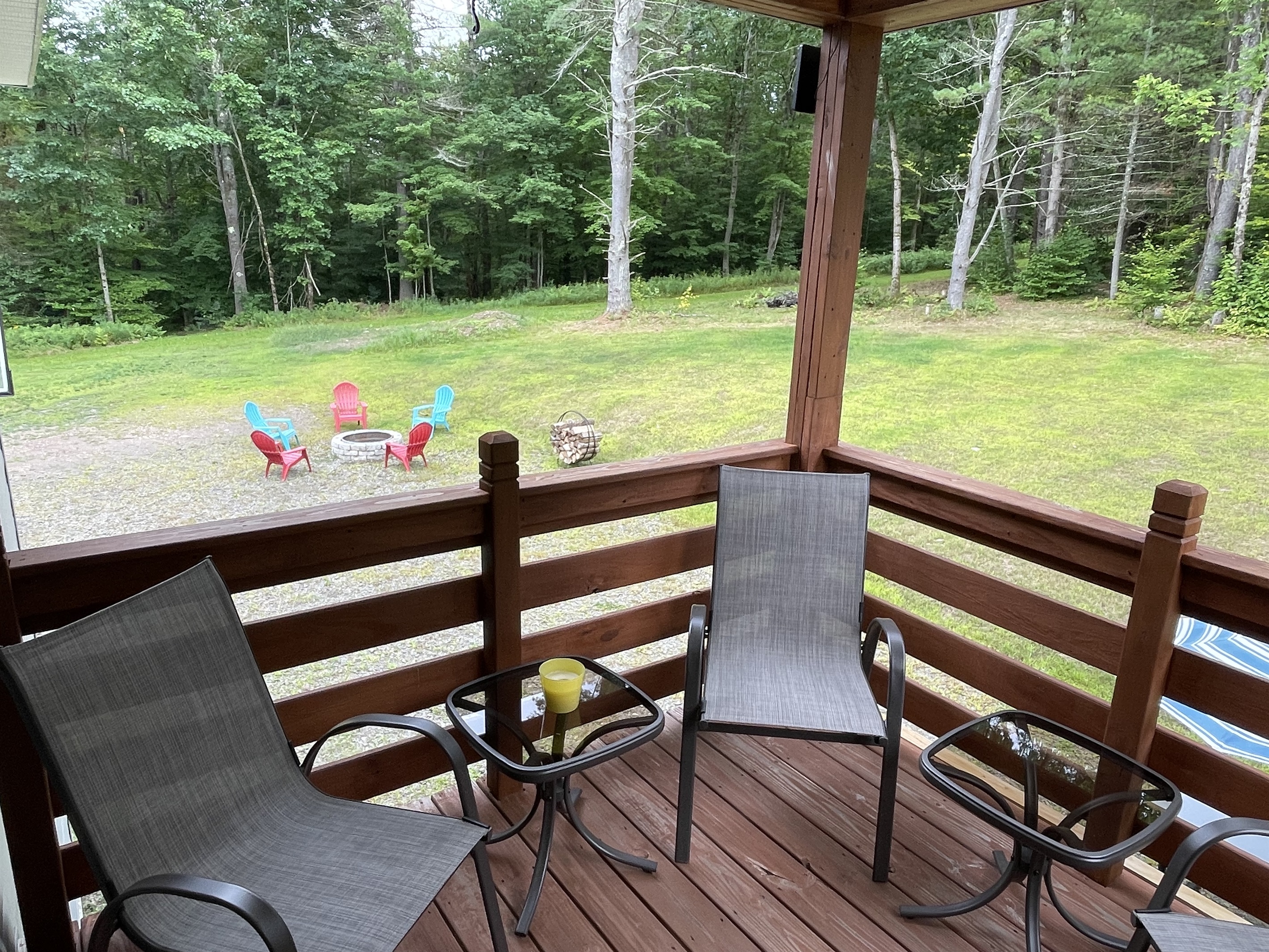 Covered deck with fire pit below