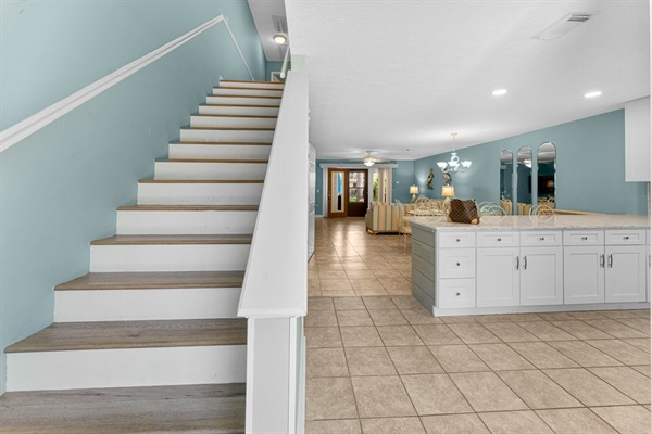 Stairs to the upstairs where bedrooms are located