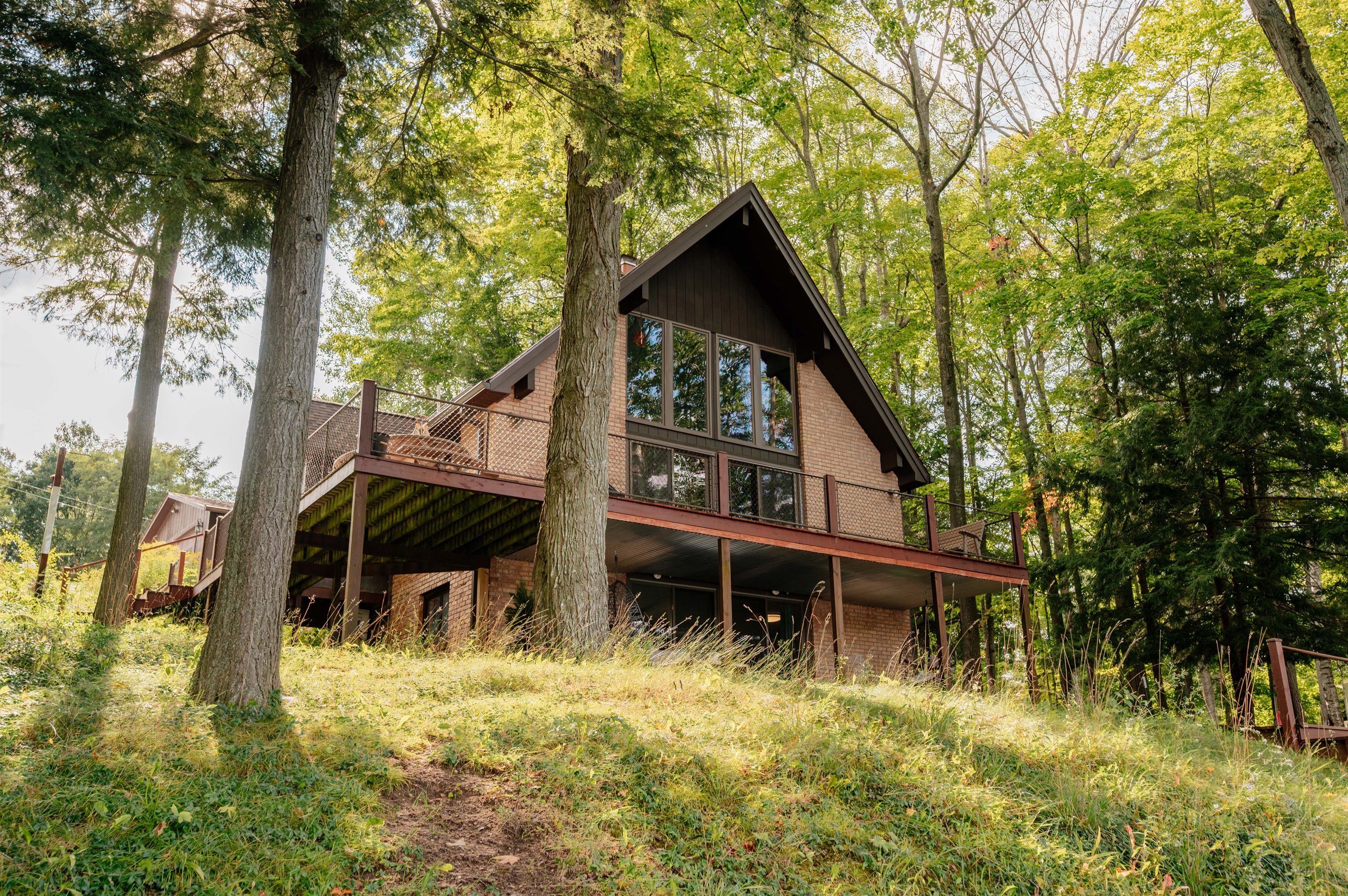 Side view of Loon’s Lakehouse nestled among the trees