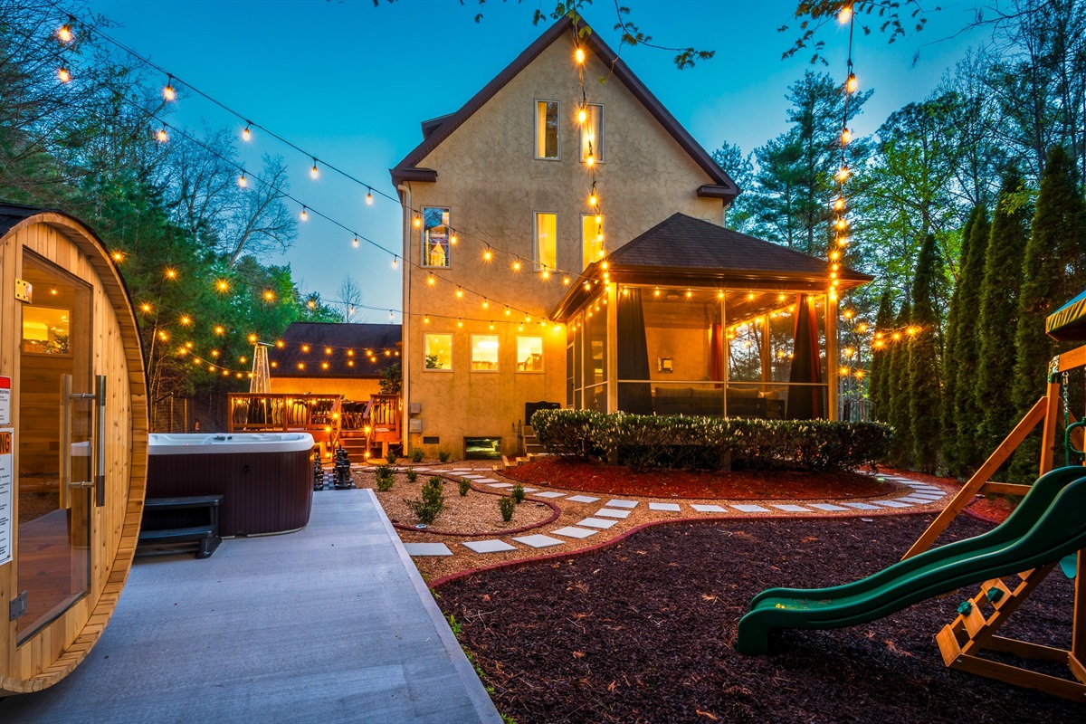 Backyard setup with sauna, hot tub, and outdoor lighting - an ideal way to unwind after hiking near the Blue Ridge Parkway