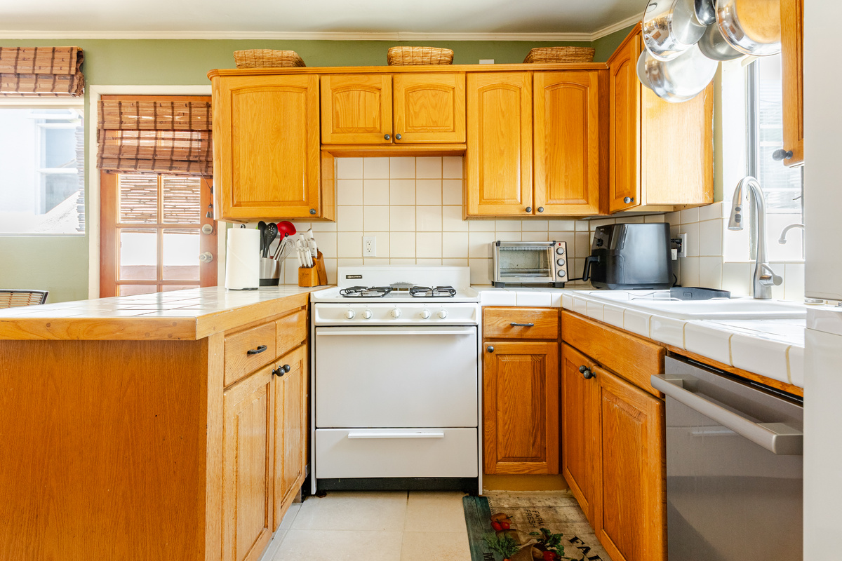 Kitchen includes all major appliances and fully stocked cabinets. There's also a built in water filter on the kitchen sink.