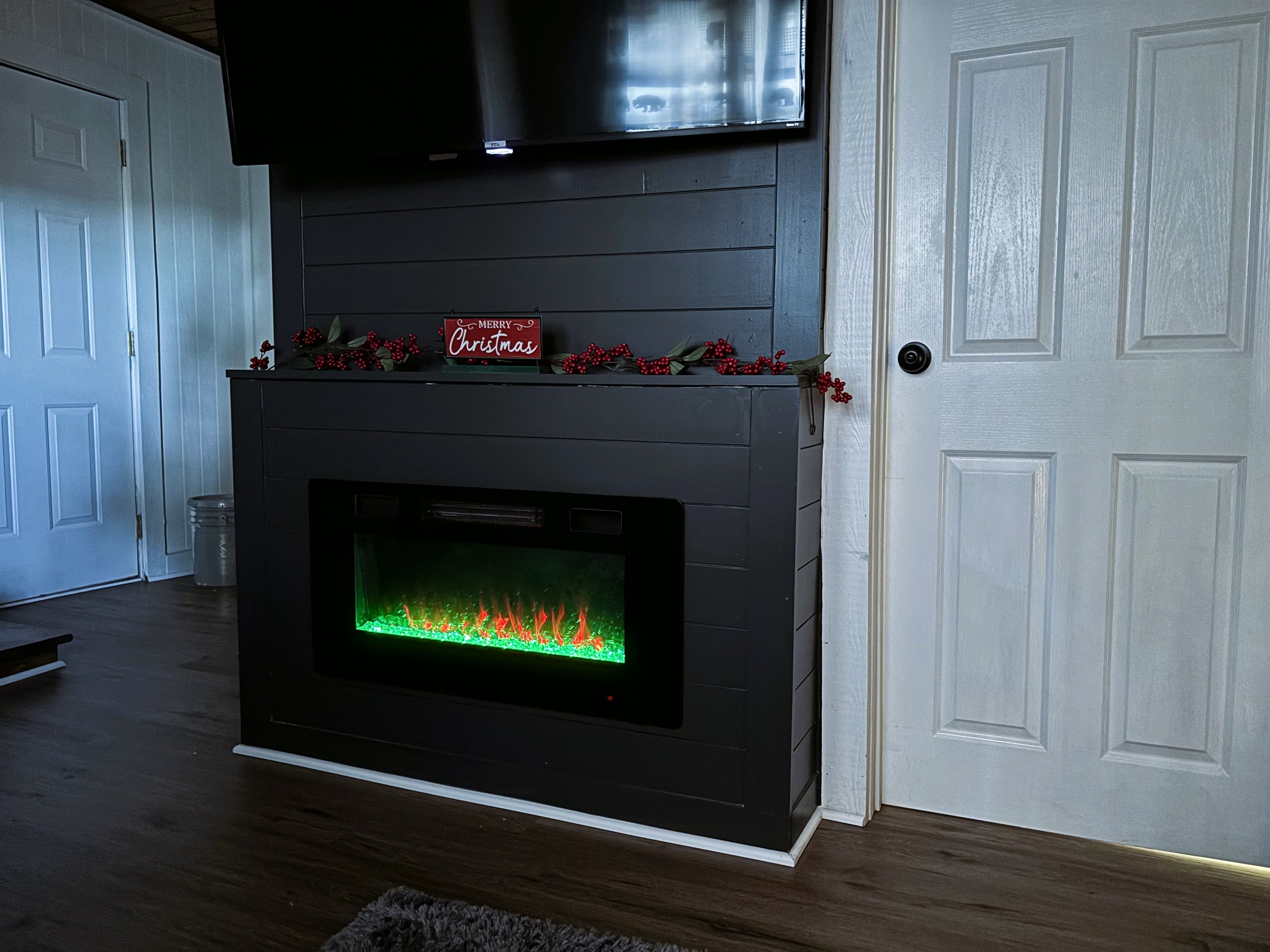Enjoy the cozy electric fireplace in the family room downstairs. Turn on the blower to warm by the fire.