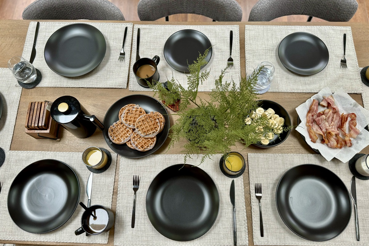 “A beautifully set dining table ready for family feasts and laughter.”