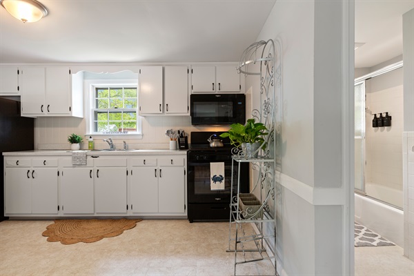 A little kitchen with a big heart, fully stocked and warmly welcoming!