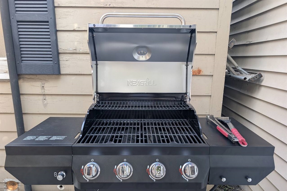 Outdoor BBQ grill for easy cookouts and outdoor dining.