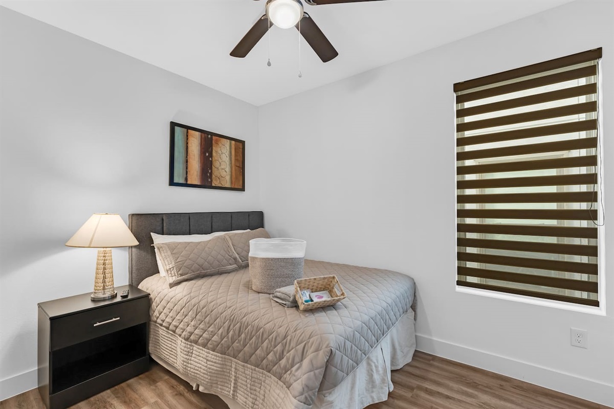 Comfortable and stylish guest room with room darkening shades for restful stays.