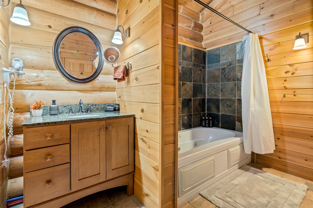 Private master ensuite with full bath amenities