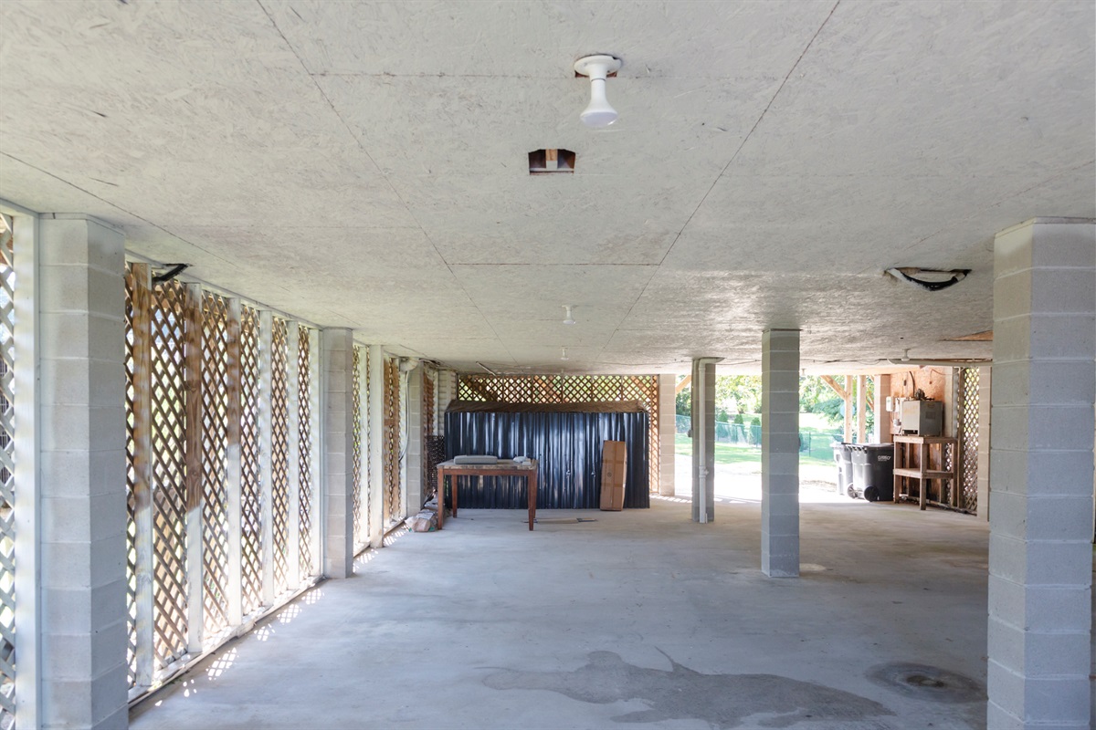 Ample covered parking tucked beneath the home keeps your stay stress-free.
