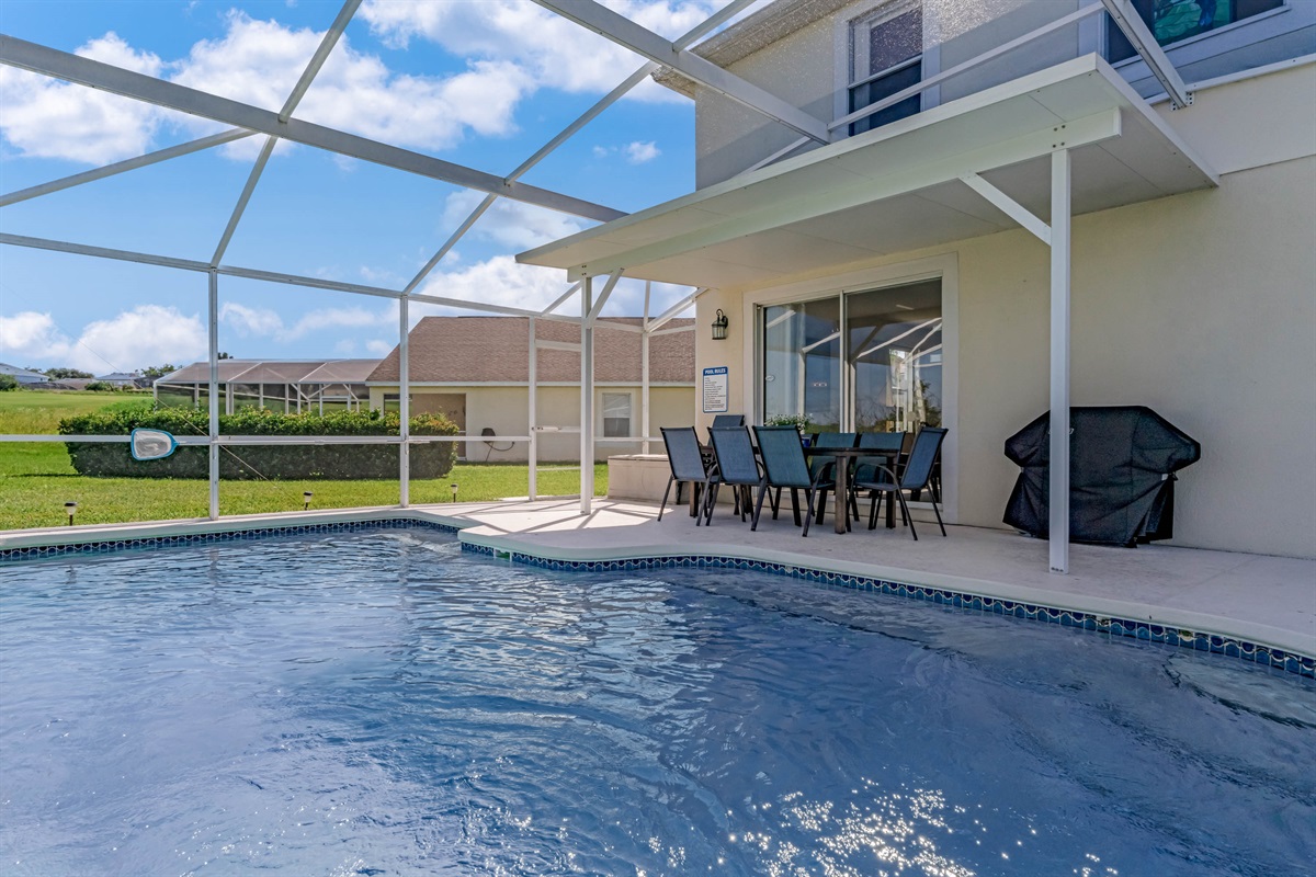 The covered lanai allos sitting outside even in a drizzle.  BBQ is free for guests as well!