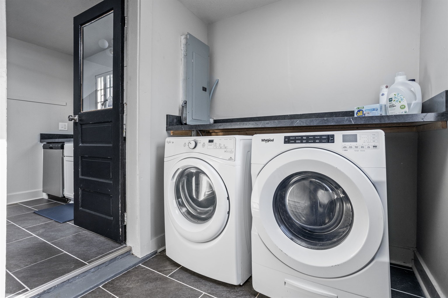 Laundry with detergent provided.