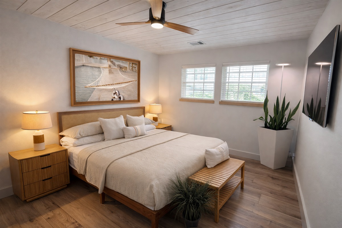 Primary bedroom with smart Tv and King size bed