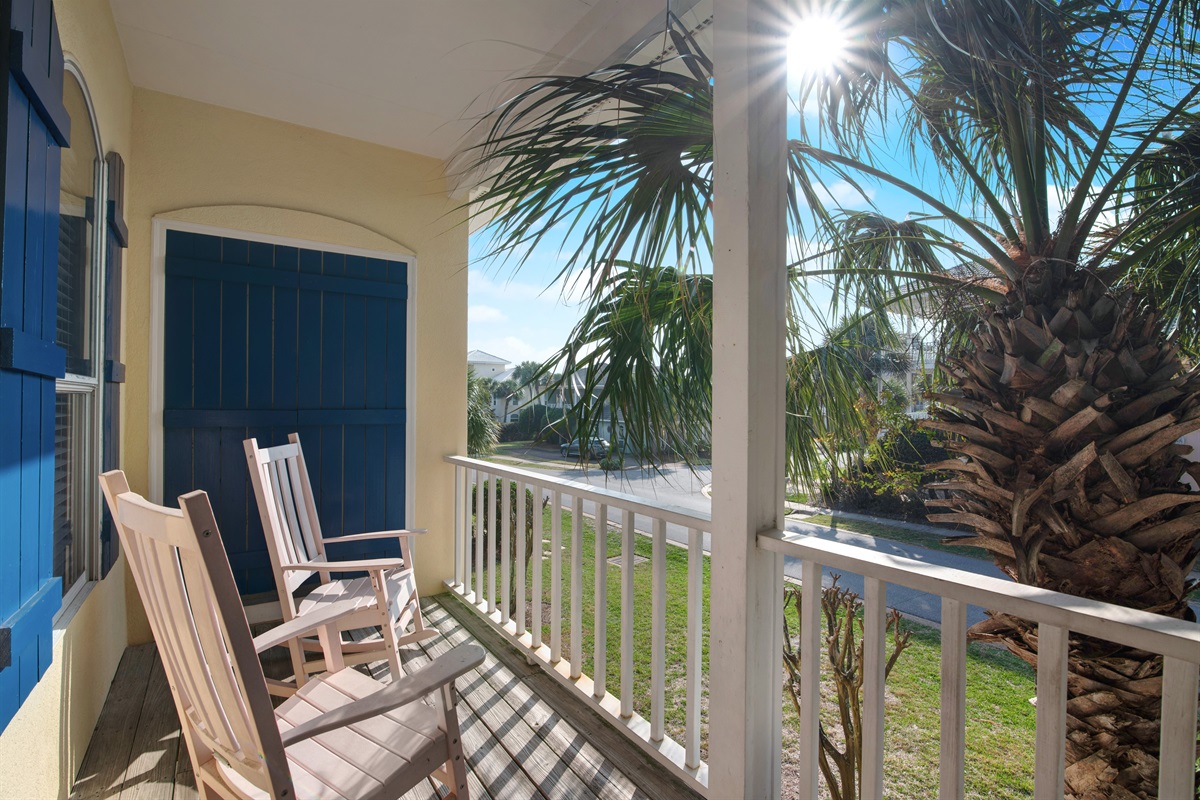 Balcony with rocking chairs and tropical views