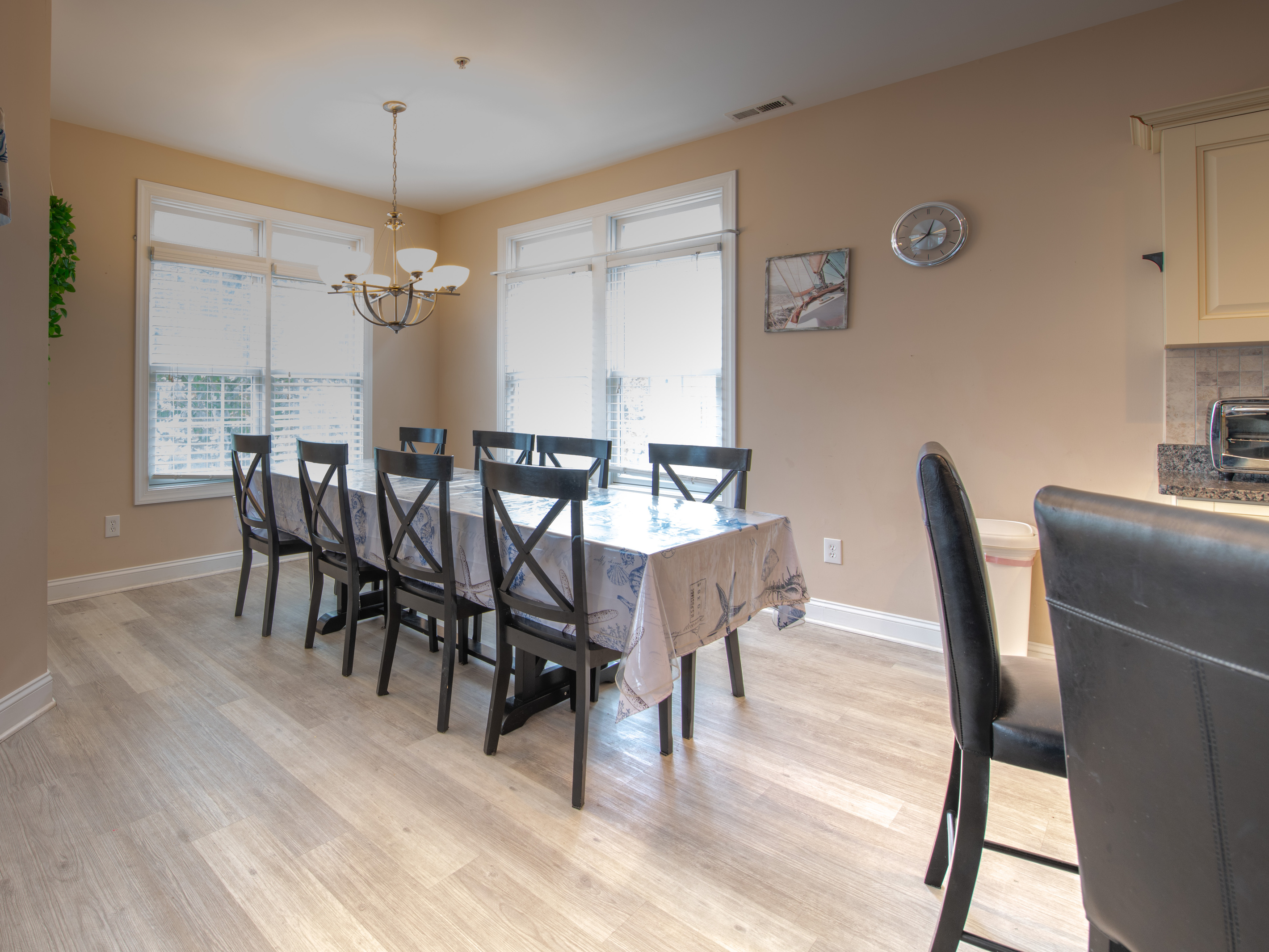 Dining Table with Seating for Eight Adjacent to Kitchen