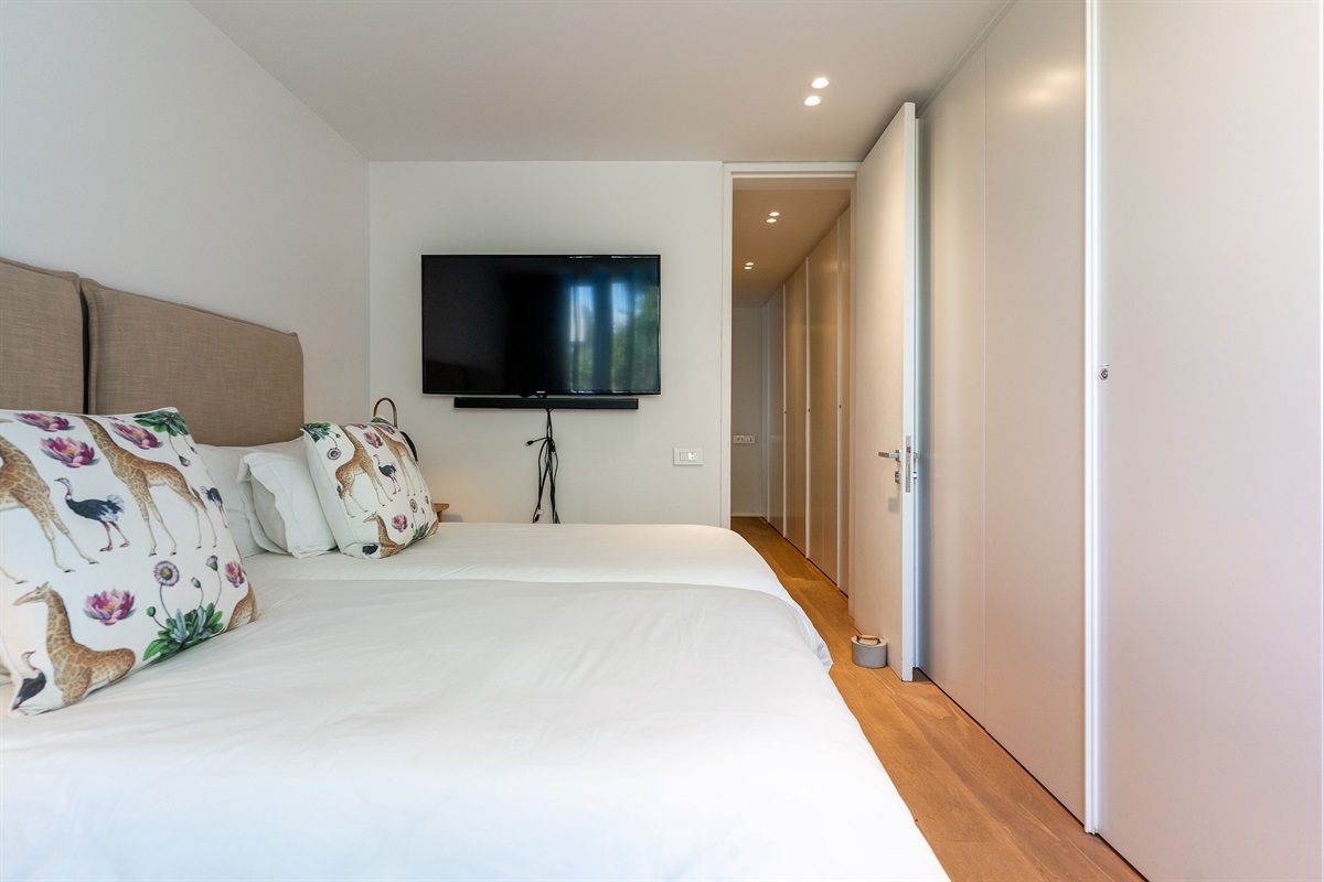 Bedroom 4 with private patio adjacent full bath