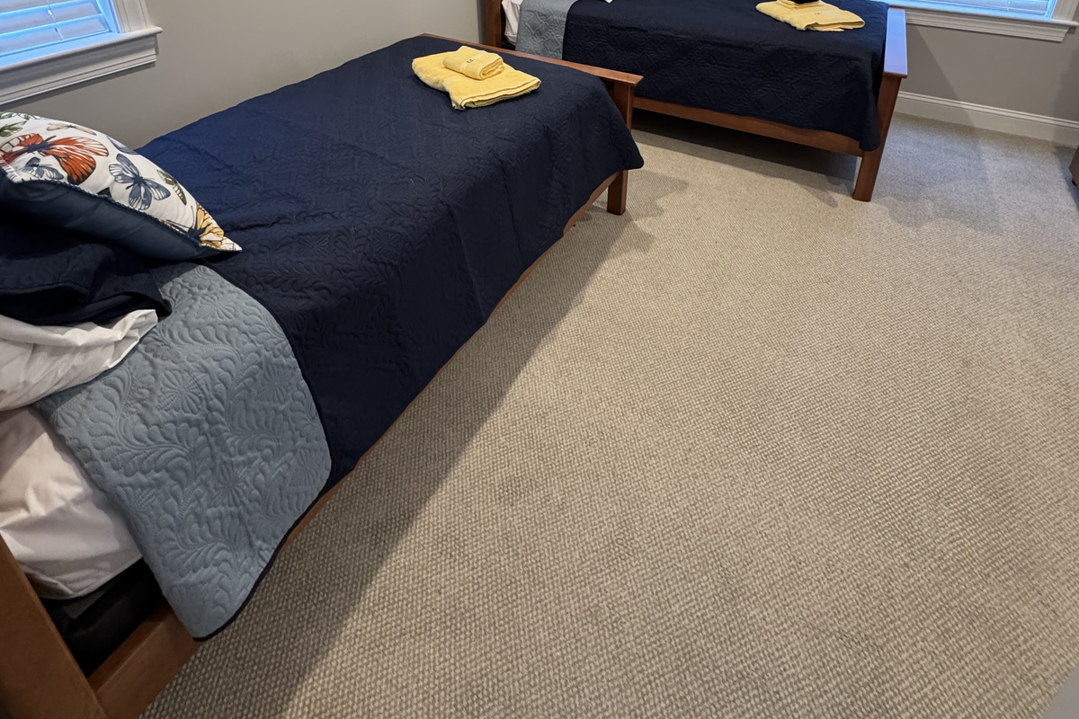 Large Bedroom with two single beds and Private Bathroom