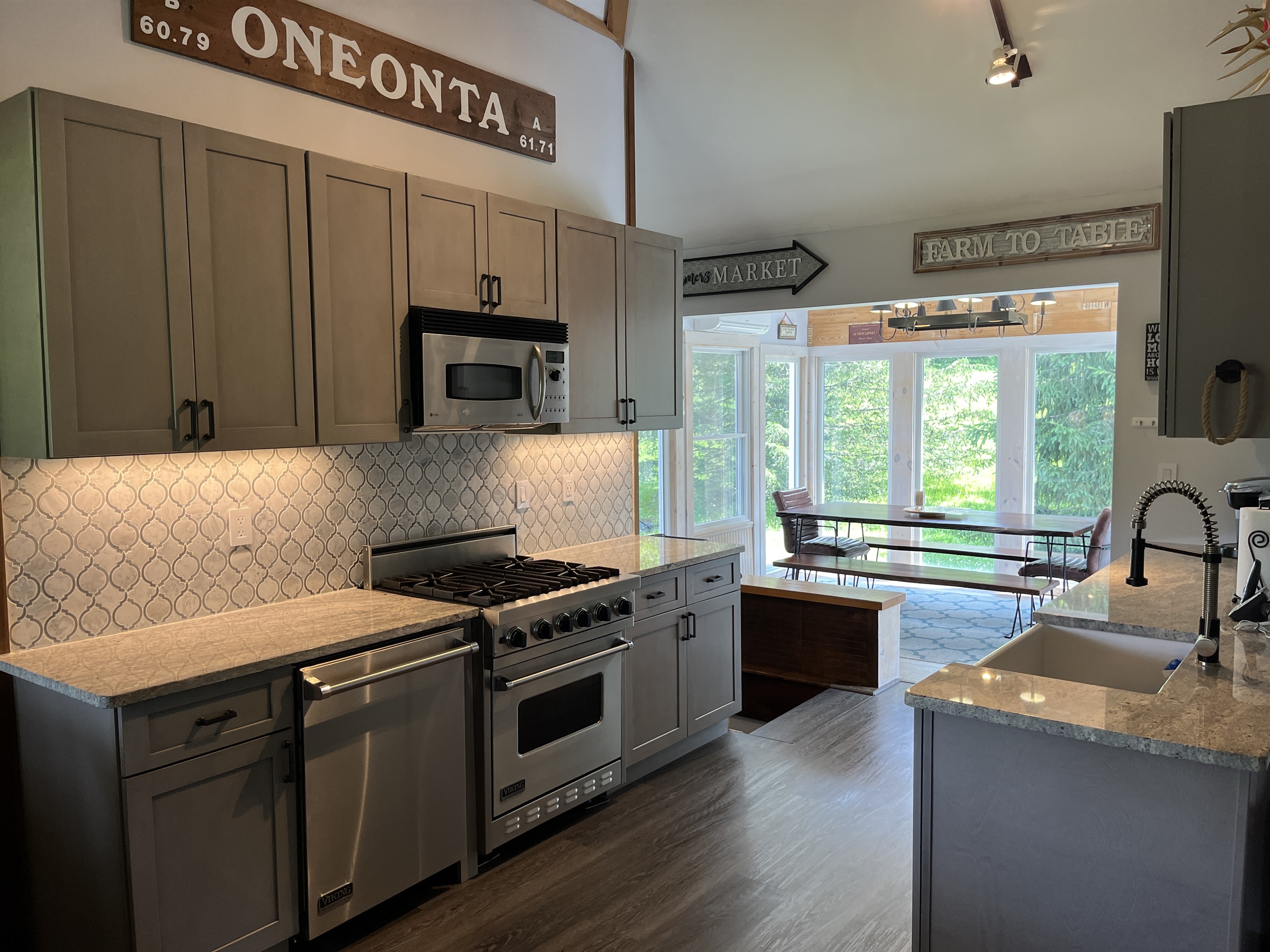 Shagbark Hill fully equipped contemporary kitchen view into the dining room.