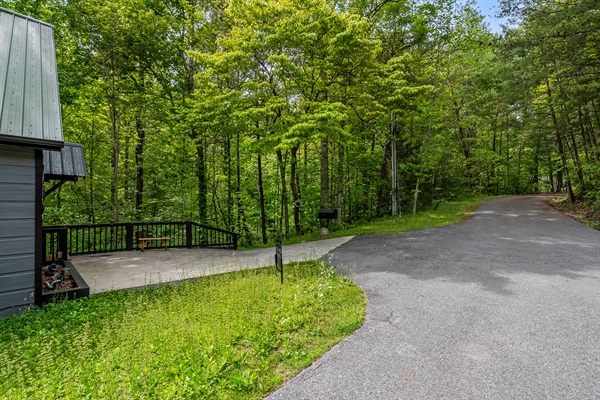 Flat road and parking pad for easy winter access.