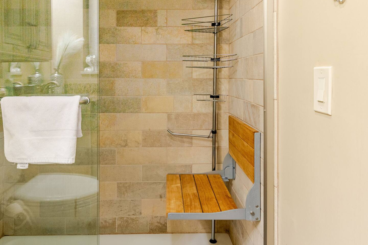 Master Bathroom with a Comfortable Sit-Down Chair