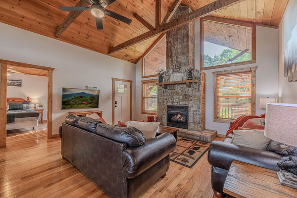 Vaulted ceilings, rustic charm and beautiful stone fireplace create the perfect mountain retreat.